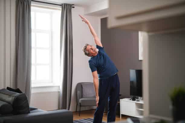 Senior Man Exercising Indoors